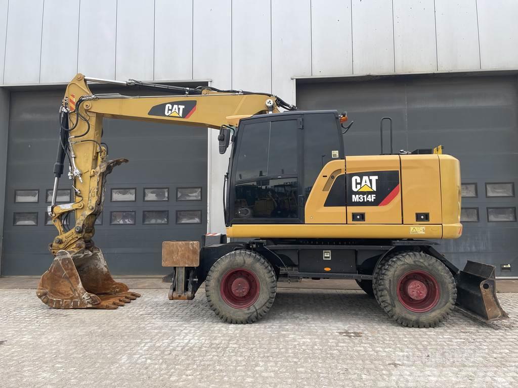 CAT M314F with Outriggers Wheeled excavators