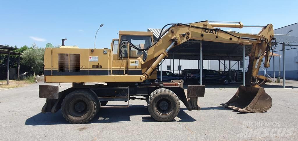 CAT 214 B Εκσκαφείς με τροχούς - λάστιχα