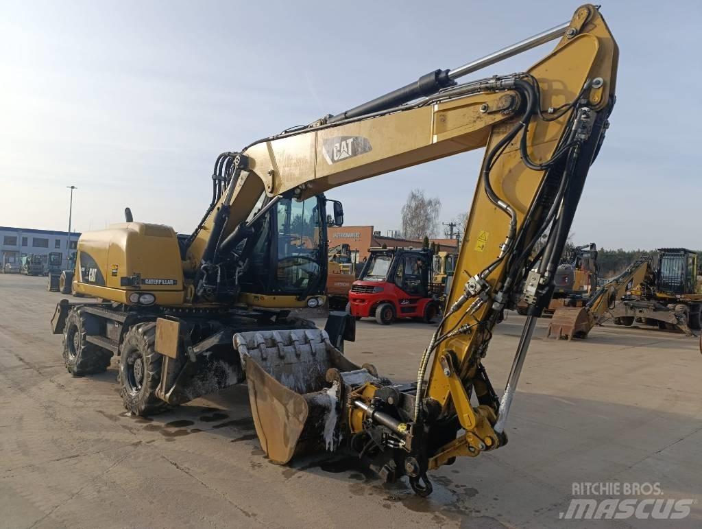 CAT M 313 D Εκσκαφείς με τροχούς - λάστιχα