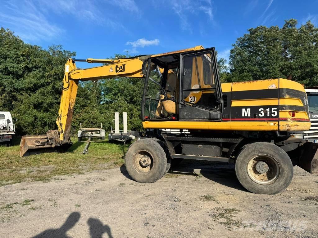 CAT M 315 Εκσκαφείς με τροχούς - λάστιχα