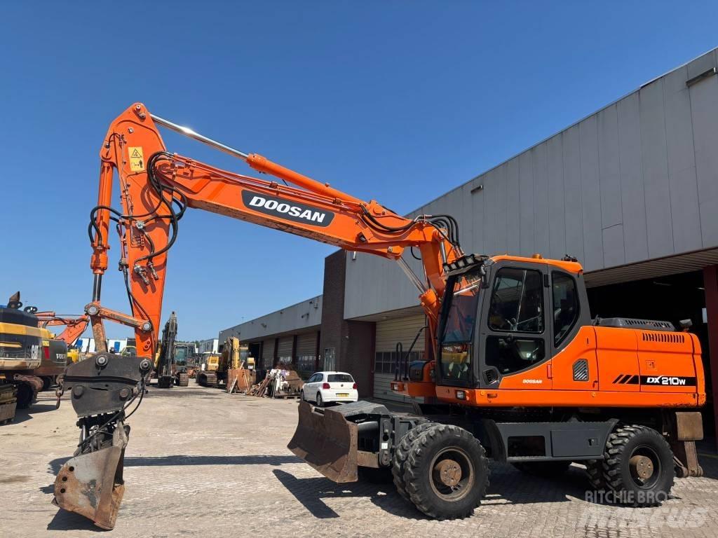 Doosan DX 210 W Εκσκαφείς με τροχούς - λάστιχα