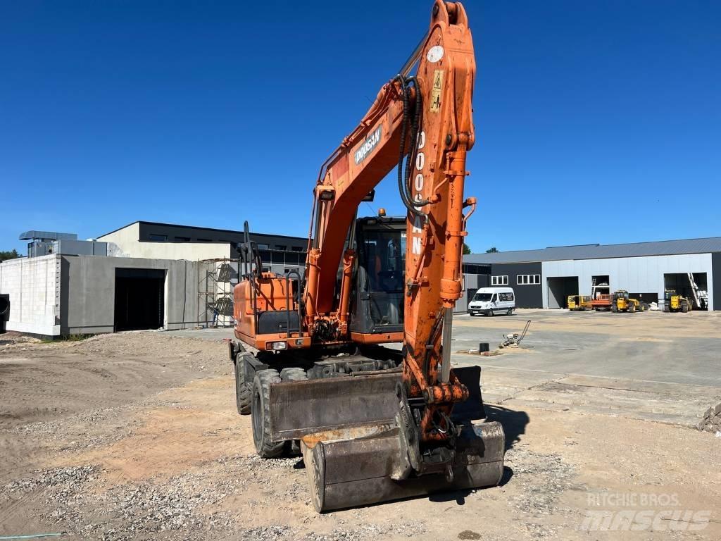 Doosan DX 140 W Εκσκαφείς με τροχούς - λάστιχα