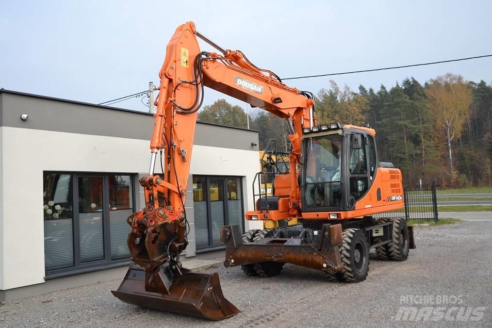 Doosan DX 140 W Εκσκαφείς με τροχούς - λάστιχα