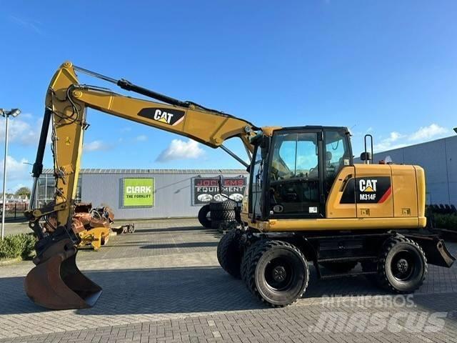 CAT M 314 F Εκσκαφείς με τροχούς - λάστιχα