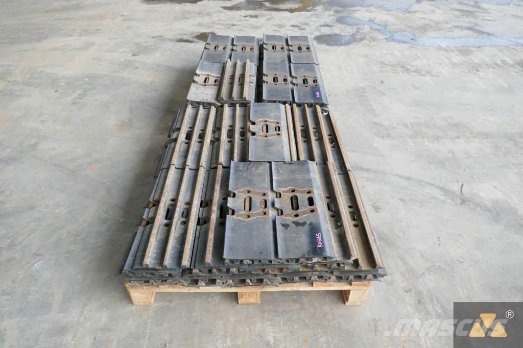 CAT 320 Trackshoes Ελαστικά και ζάντες