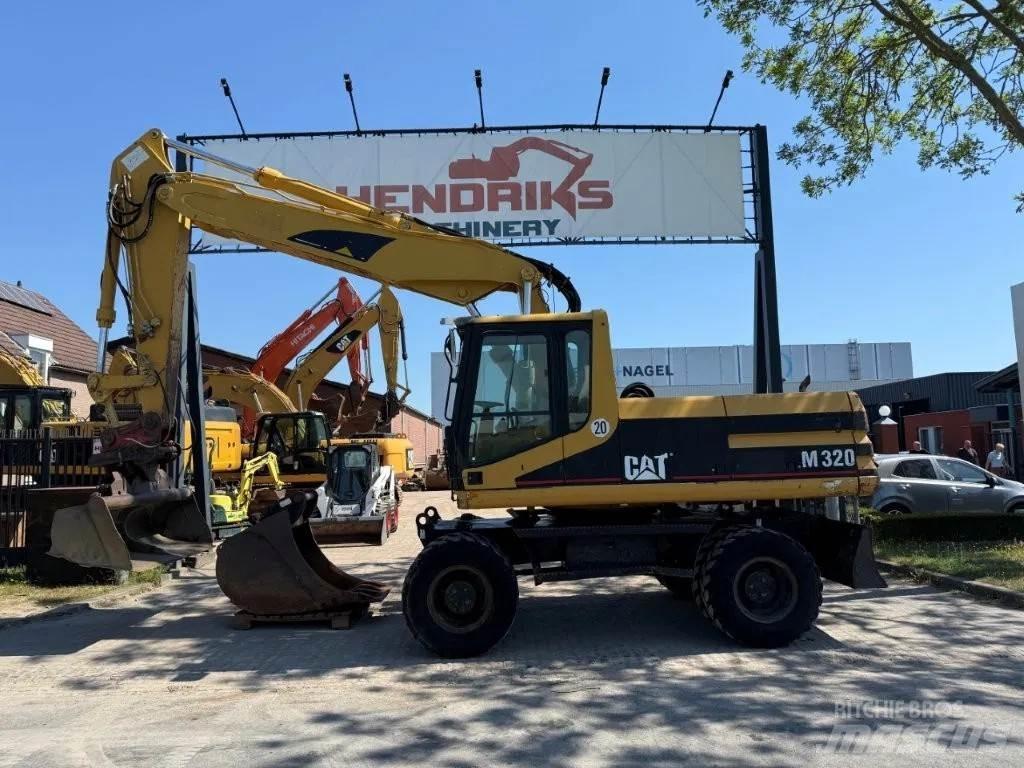 CAT M320 2001 Εκσκαφείς με τροχούς - λάστιχα