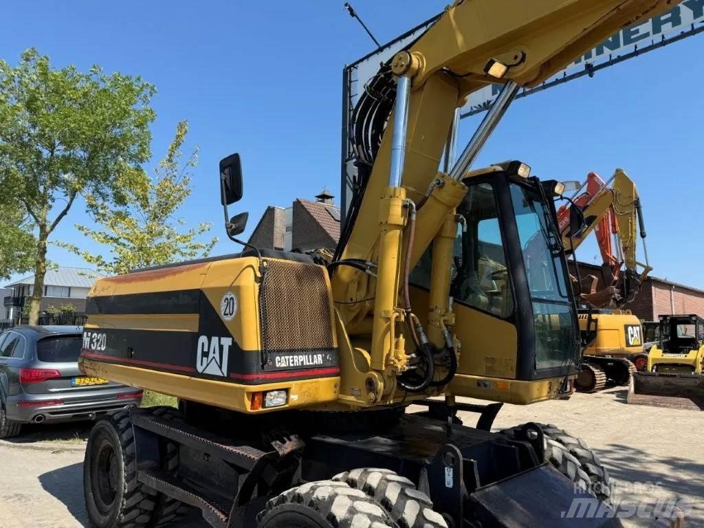 CAT M320 2001 Εκσκαφείς με τροχούς - λάστιχα