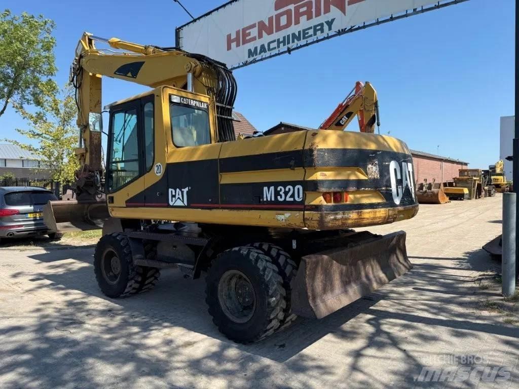 CAT M320 2001 Εκσκαφείς με τροχούς - λάστιχα
