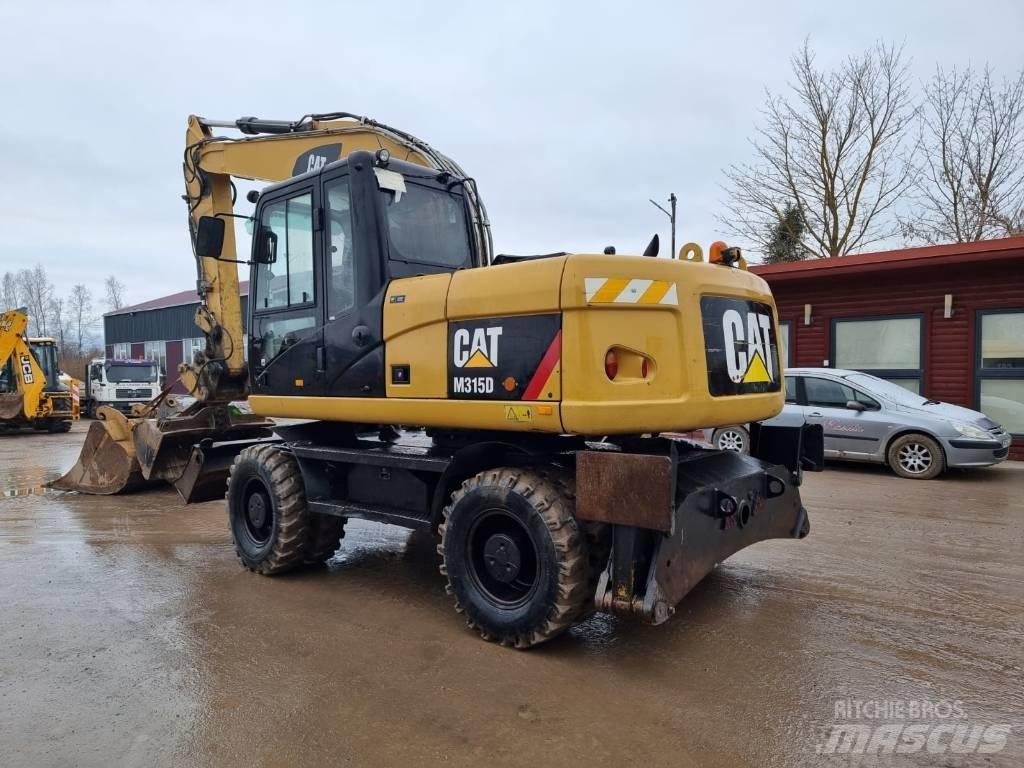 CAT M 315 D II Εκσκαφείς με τροχούς - λάστιχα