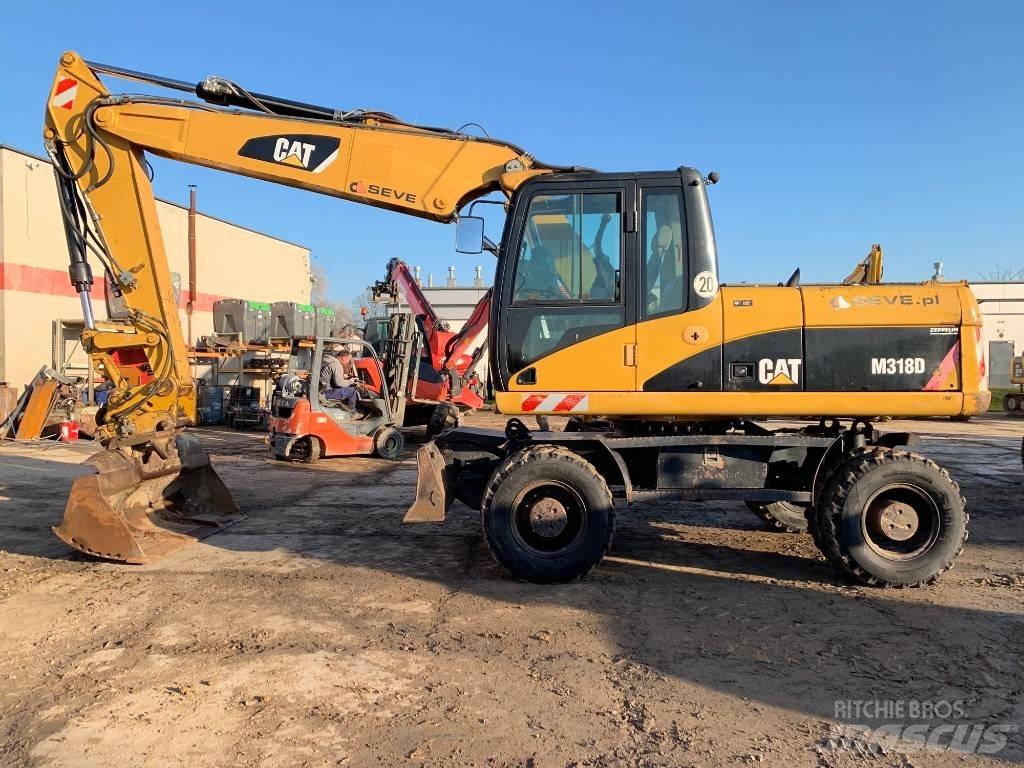 CAT M 318 D Εκσκαφείς με τροχούς - λάστιχα