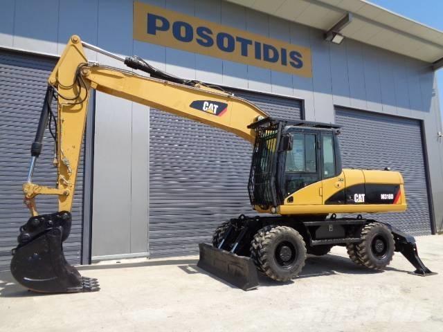 CAT M 318 D Εκσκαφείς με τροχούς - λάστιχα