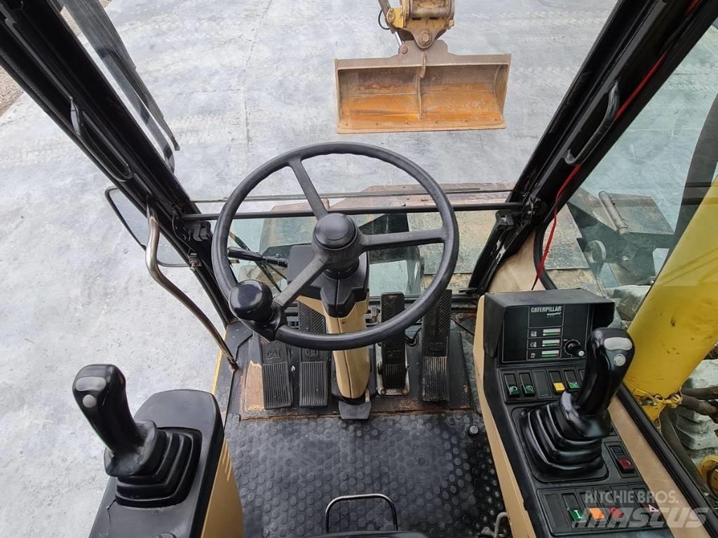 CAT M 312 Εκσκαφείς με τροχούς - λάστιχα
