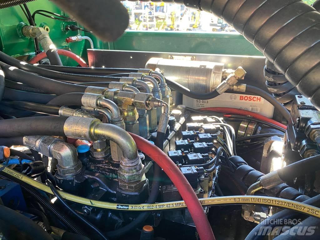 John Deere 1110 Μεταφορείς ξυλείας