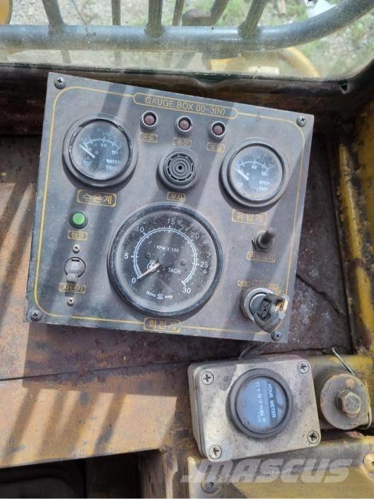 CAT 973 Φορτωτές με λάστιχα (Τροχοφόροι)