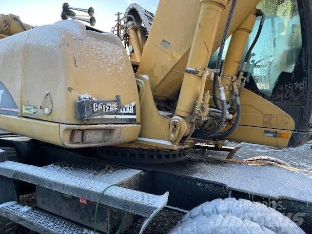 CAT M 322 C MH Εκσκαφείς με τροχούς - λάστιχα