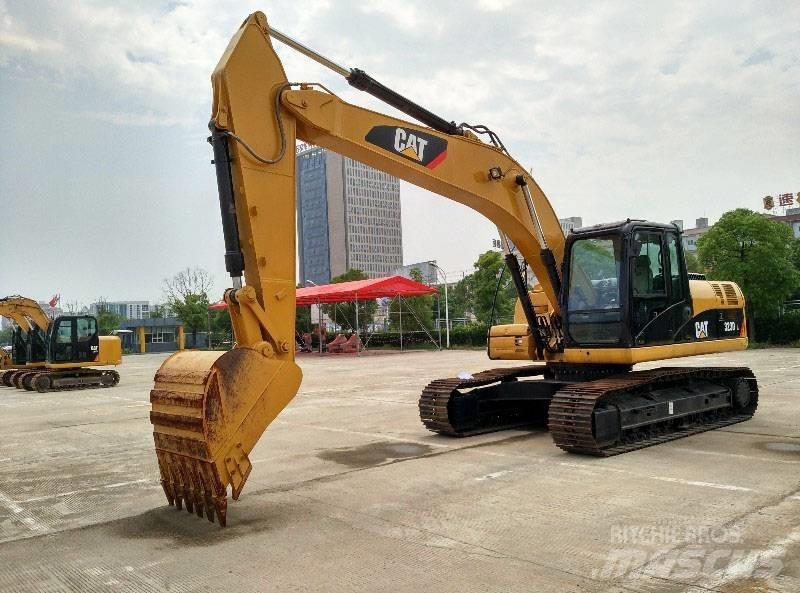 CAT 323 Εκσκαφείς με ερπύστριες