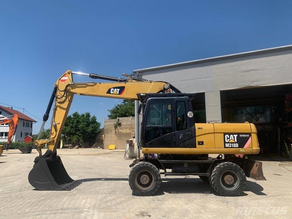 CAT M 318 D Εκσκαφείς με τροχούς - λάστιχα
