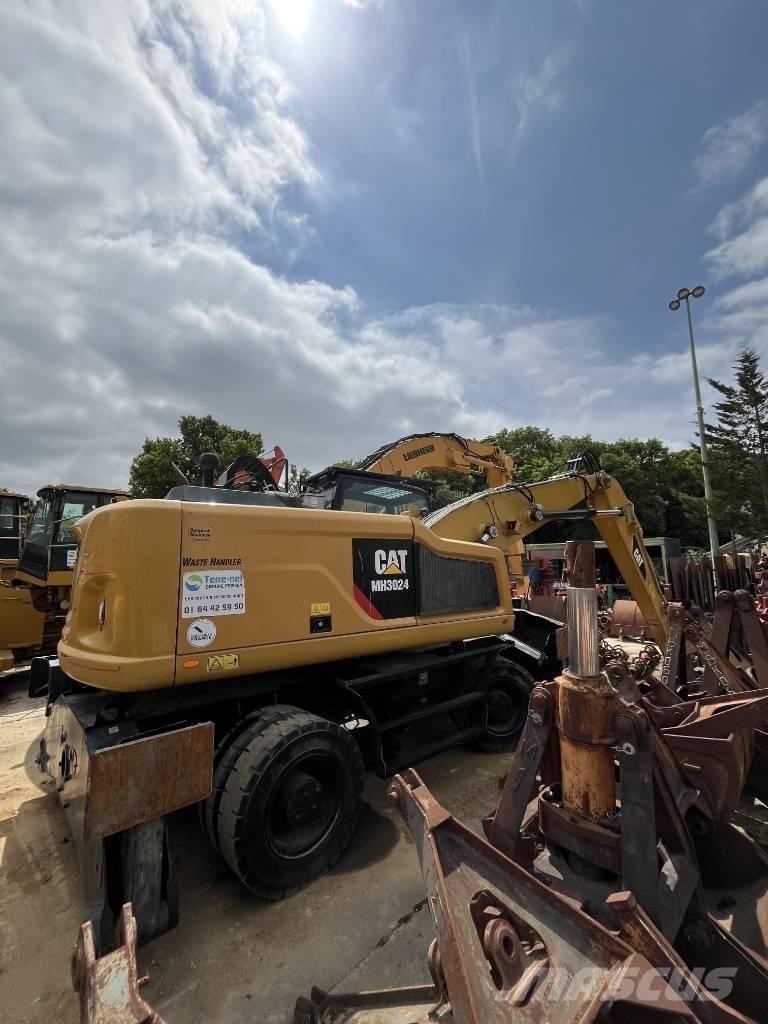 CAT MH 3022 Εκσκαφείς με τροχούς - λάστιχα