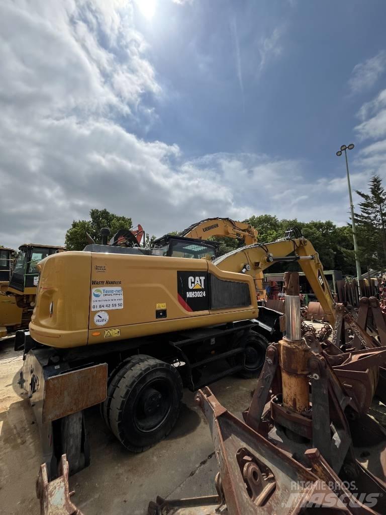 CAT MH 3024 Εκσκαφείς με τροχούς - λάστιχα