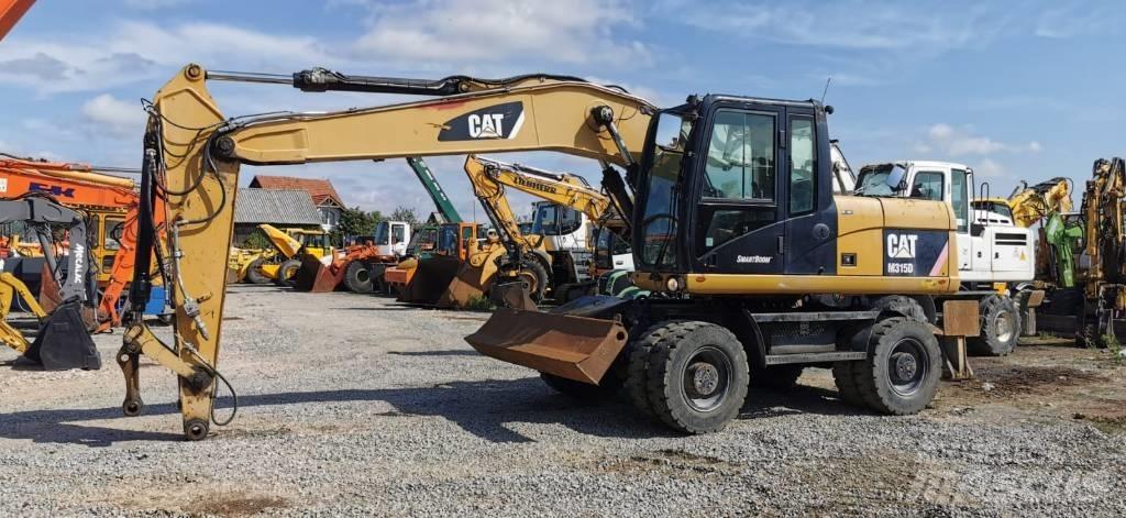 CAT M 315 D Εκσκαφείς με τροχούς - λάστιχα