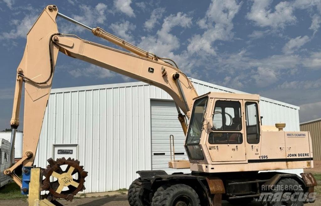 John Deere 595 Εκσκαφείς με τροχούς - λάστιχα