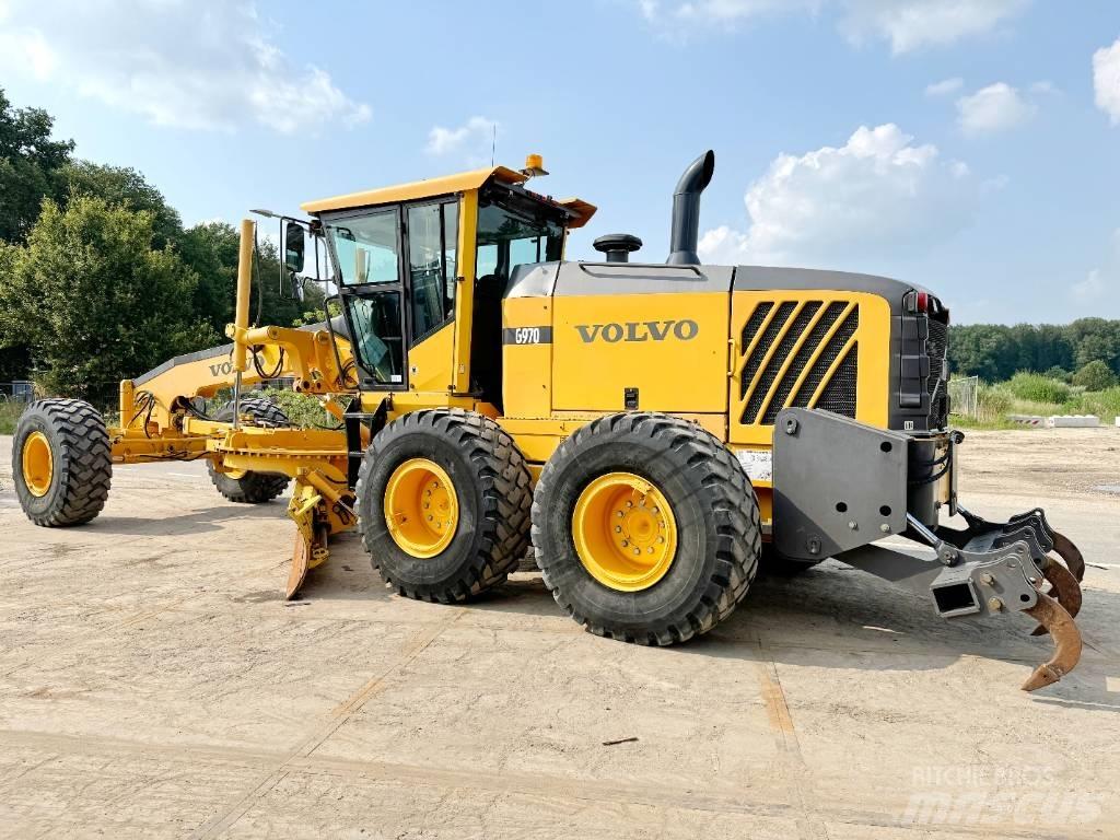 Volvo G970 + RIPPER Γκρέιντερς