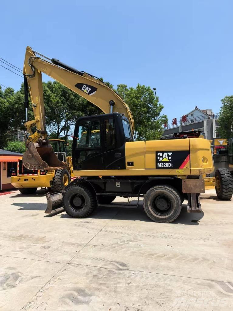 CAT M 320 Εκσκαφείς με τροχούς - λάστιχα
