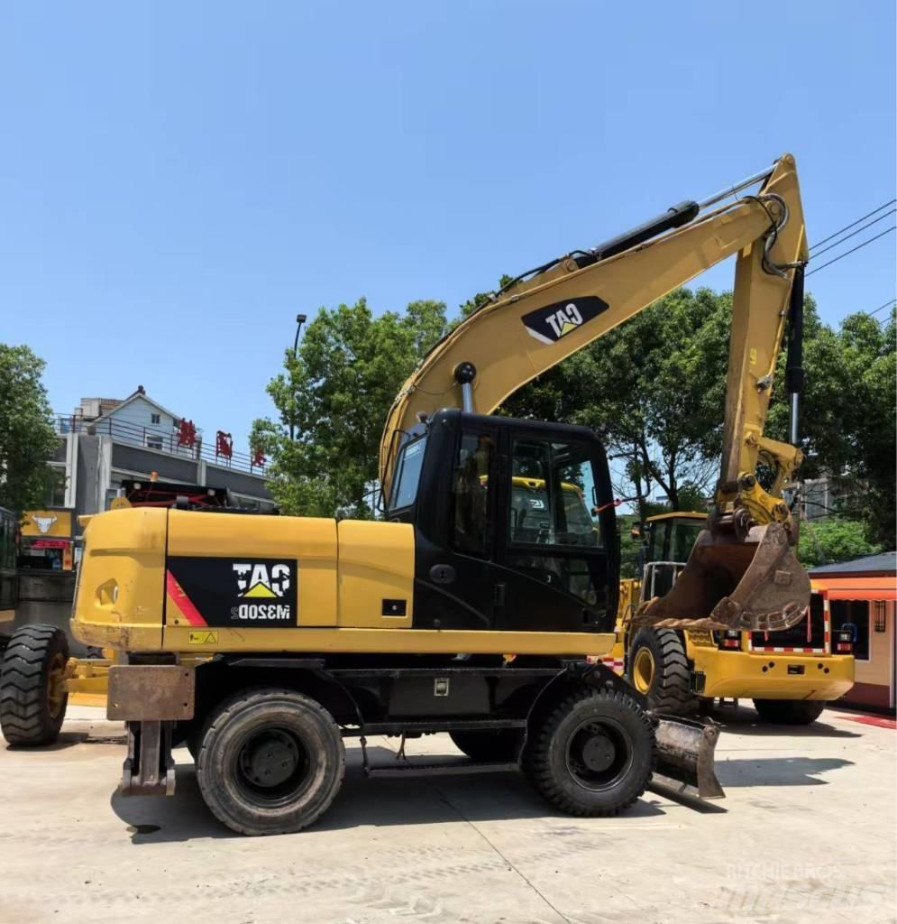 CAT M 320 Εκσκαφείς με τροχούς - λάστιχα