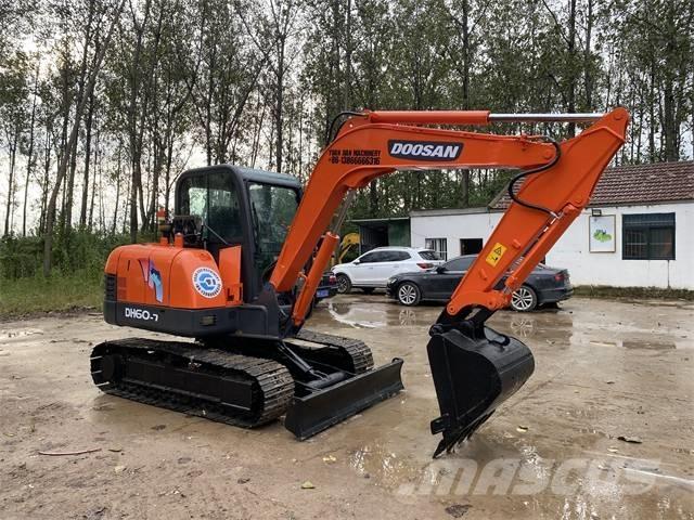 Doosan DH 140 Εκσκαφείς με τροχούς - λάστιχα