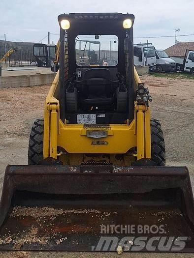 Komatsu SK815 Μίνι φορτωτές