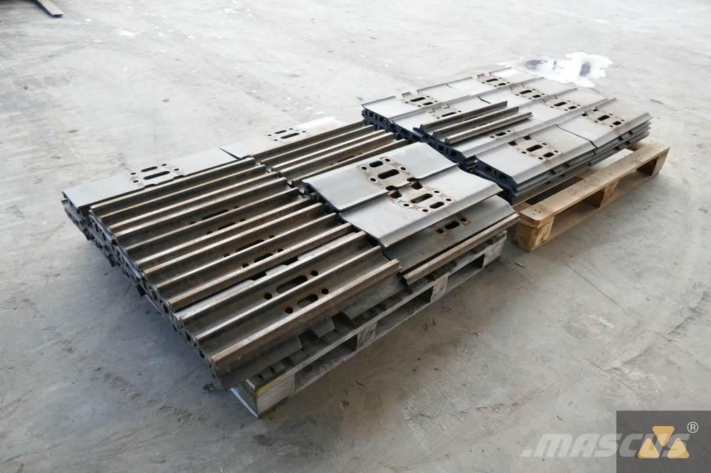 CAT 320 Trackshoes Ελαστικά και ζάντες