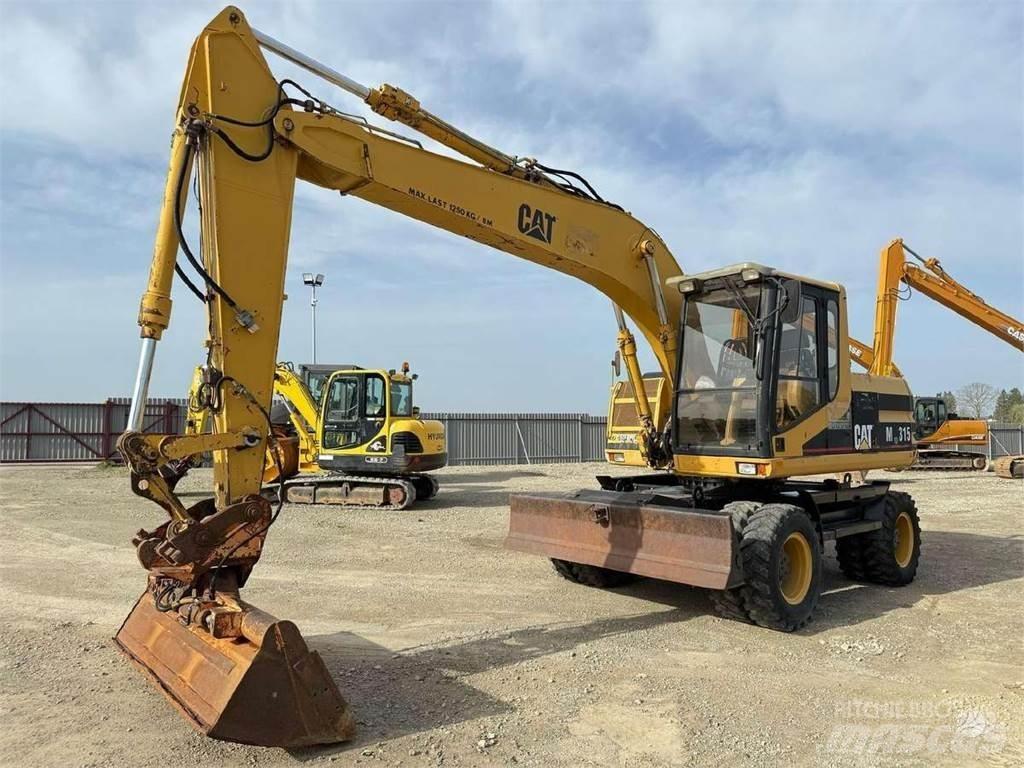CAT M 315 Εκσκαφείς με τροχούς - λάστιχα
