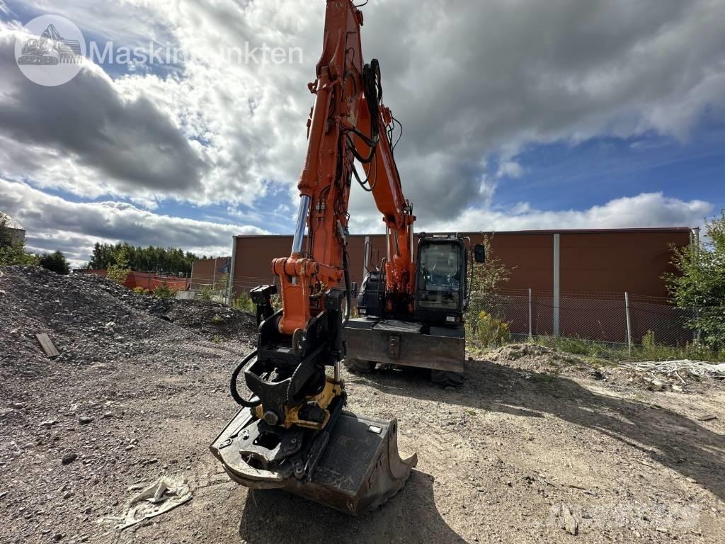 Hitachi ZX 140 W-5B Εκσκαφείς με τροχούς - λάστιχα