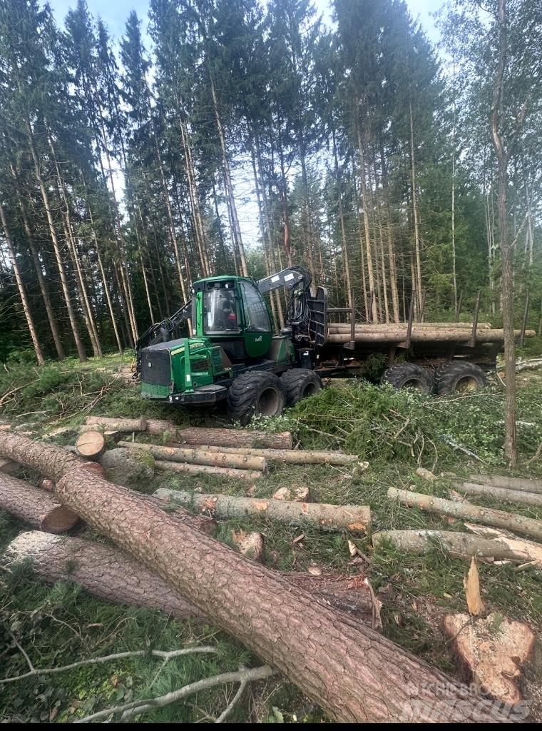 John Deere 1110 E Μεταφορείς ξυλείας