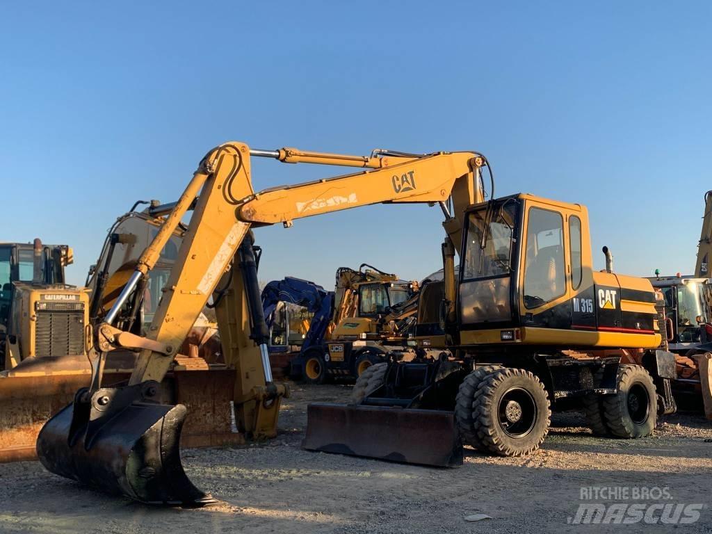CAT M 315 Εκσκαφείς με τροχούς - λάστιχα
