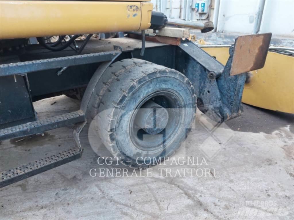 CAT MH3024 Εκσκαφείς με τροχούς - λάστιχα