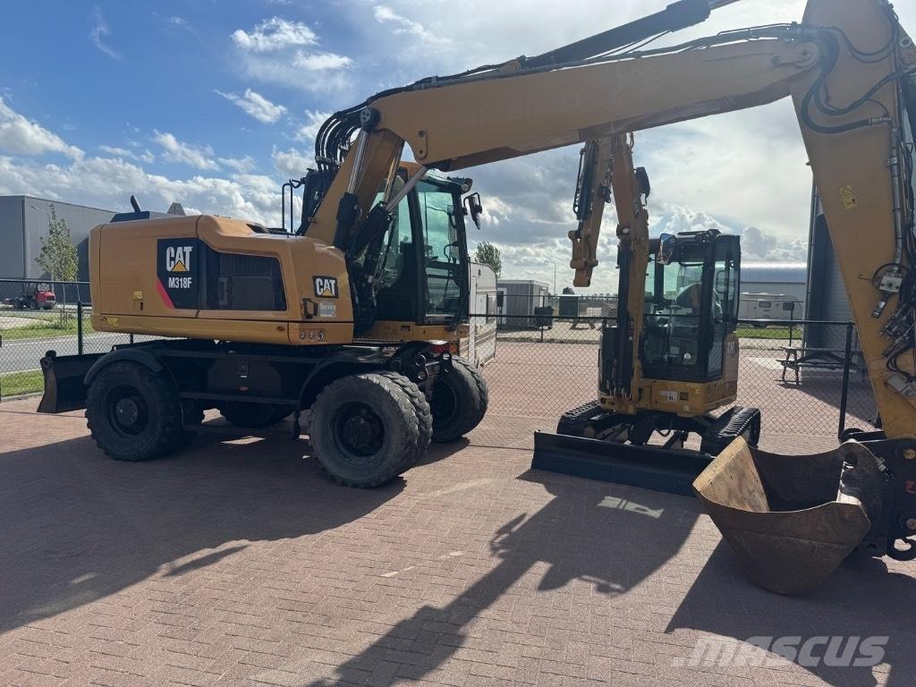 CAT 318 Εκσκαφείς με τροχούς - λάστιχα