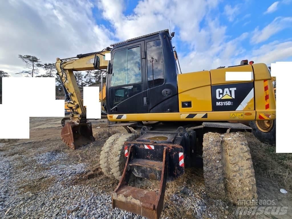 CAT M 315 D Εκσκαφείς με τροχούς - λάστιχα