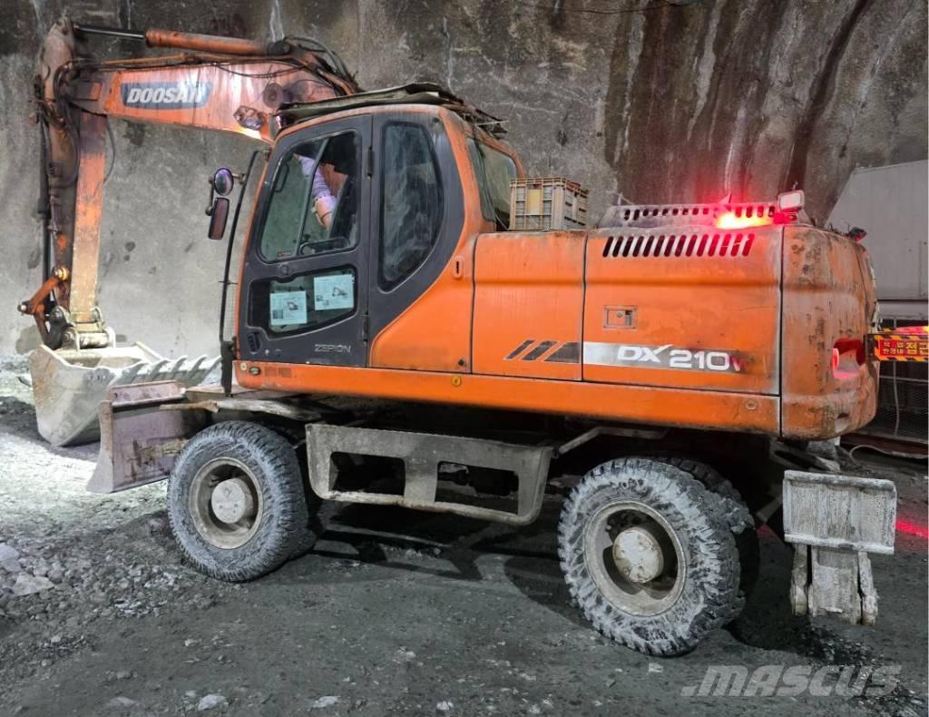 Doosan DX 210 W Εκσκαφείς με τροχούς - λάστιχα