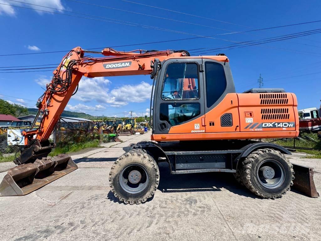 Doosan DX 140 W-3 Εκσκαφείς με τροχούς - λάστιχα