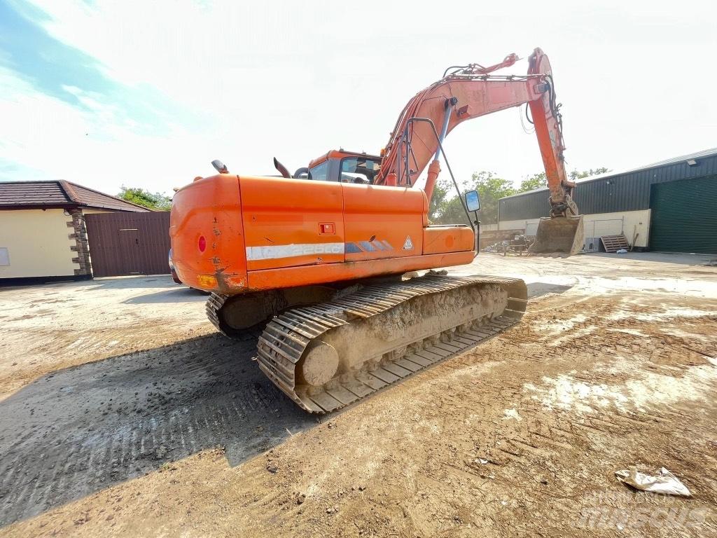 Doosan DX225 Εκσκαφείς με τροχούς - λάστιχα