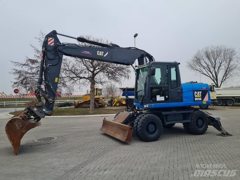 CAT M315D 2 buckets Εκσκαφείς με τροχούς - λάστιχα