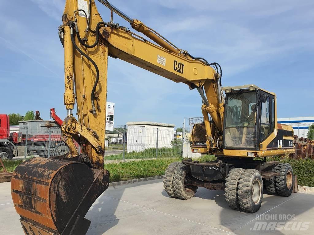 CAT M 318 Εκσκαφείς με τροχούς - λάστιχα