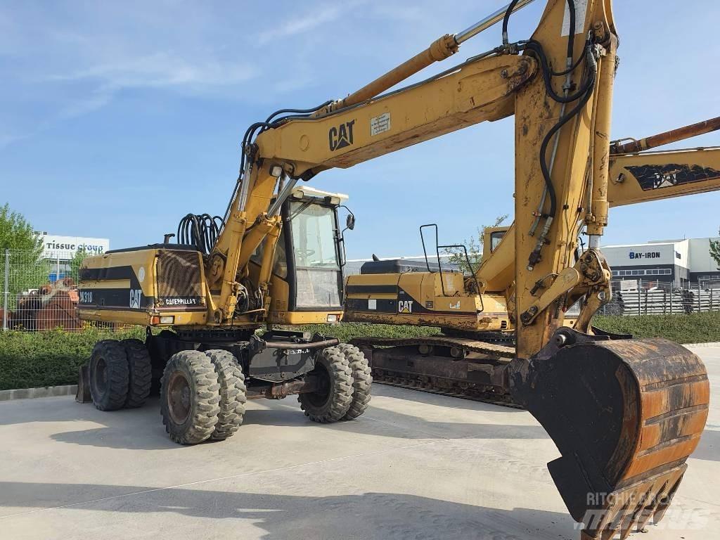CAT M 318 Εκσκαφείς με τροχούς - λάστιχα