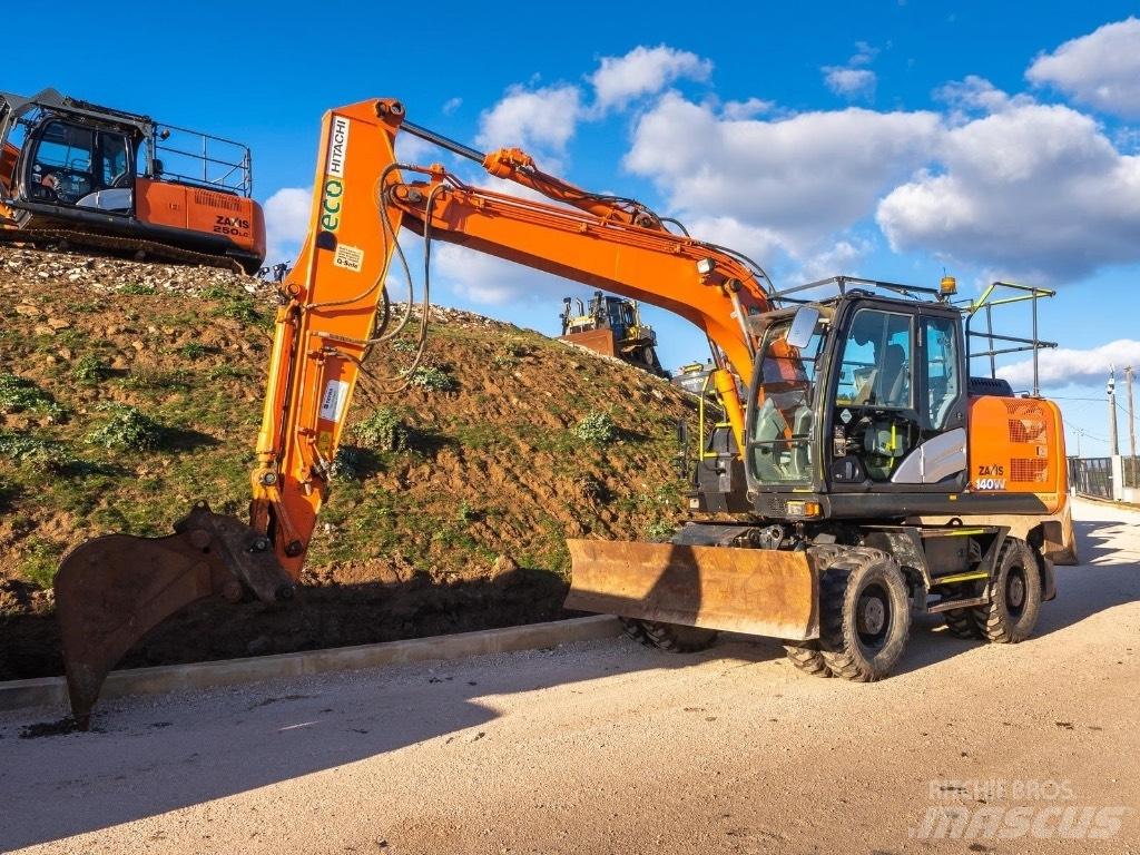 Hitachi 140W Εκσκαφείς με τροχούς - λάστιχα