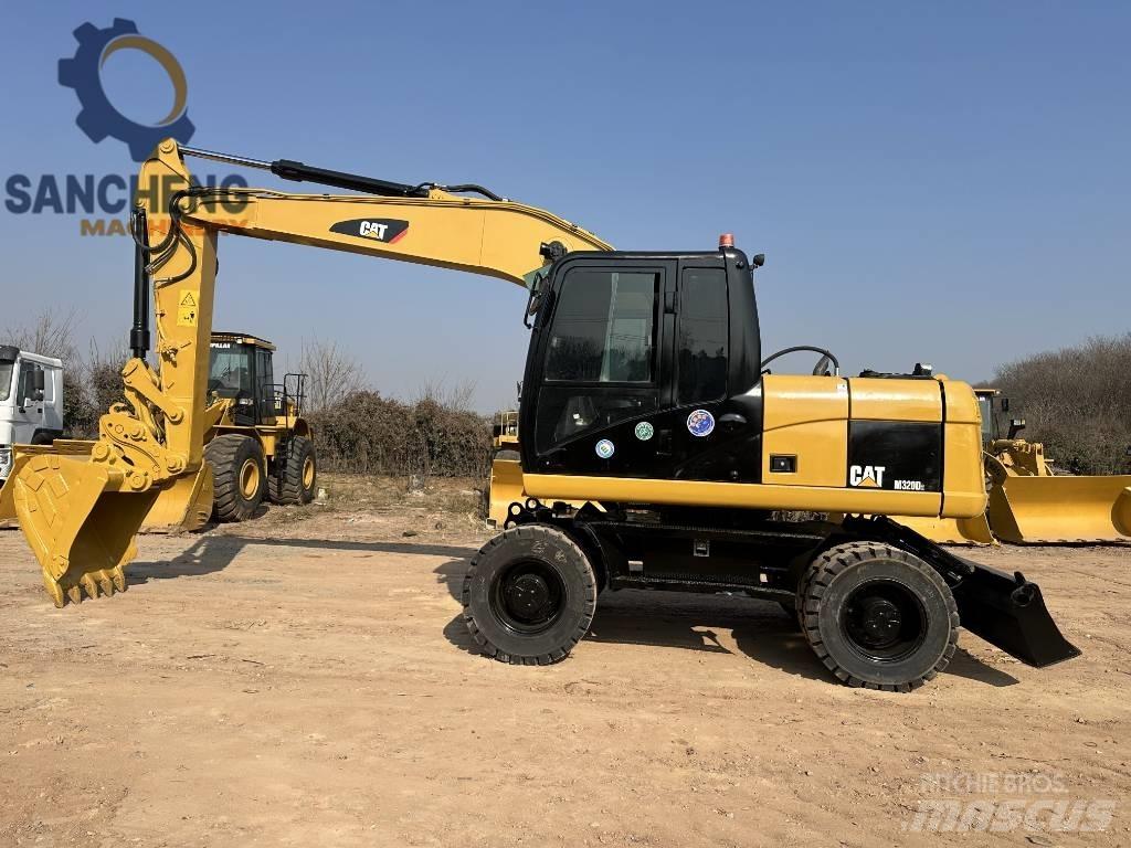 CAT M 320 D Εκσκαφείς με τροχούς - λάστιχα
