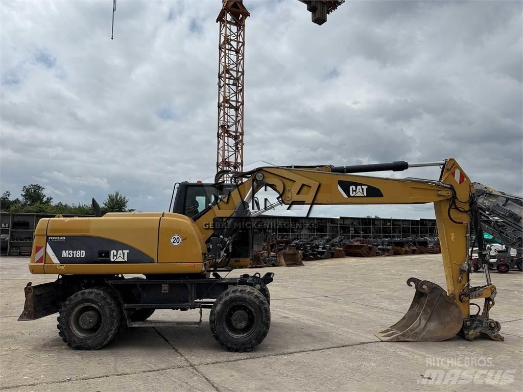 CAT M 318 D Εκσκαφείς με τροχούς - λάστιχα