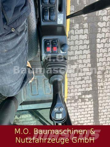 CAT MH 3022 Εκσκαφείς με τροχούς - λάστιχα