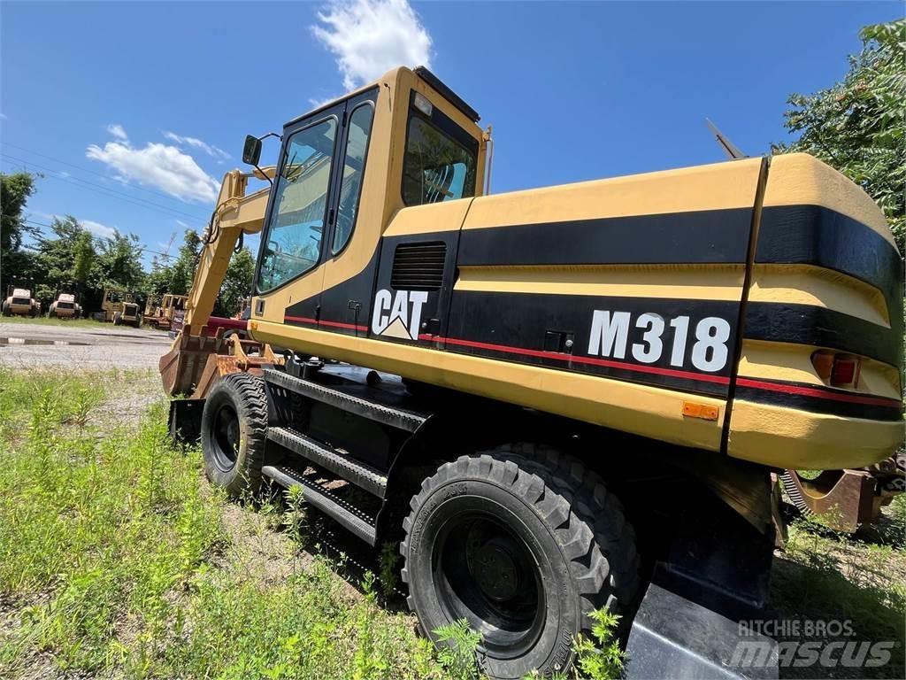 CAT M318 Εκσκαφείς με τροχούς - λάστιχα