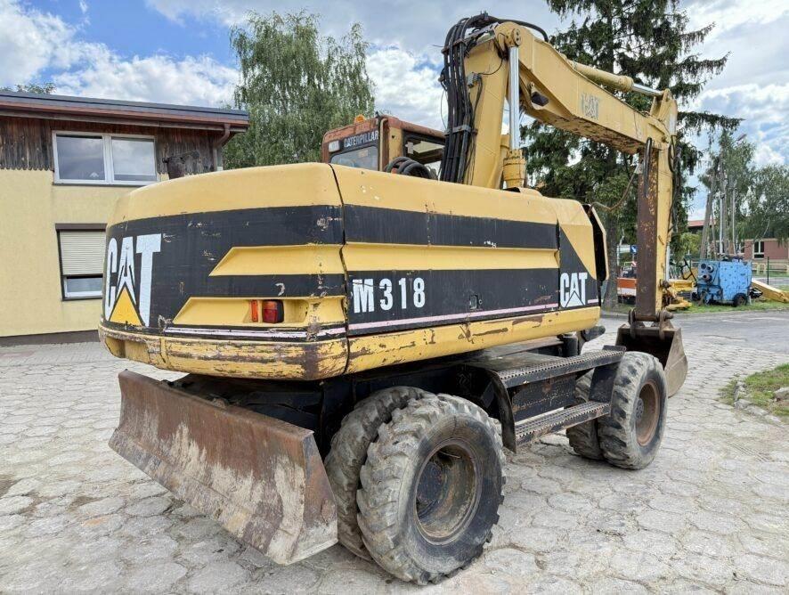 CAT M318 Εκσκαφείς με τροχούς - λάστιχα